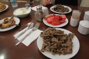 Edirne Cigeri served with yogurt, fried red chillies and tomatoes. very delicious